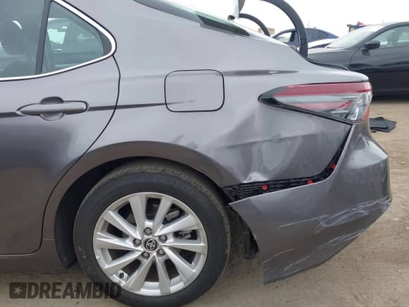 2023 Toyota Camry LE z VIN 4T1C11AKXPU119236, wystawiony jako IAAI lot #43326388 z przebiegiem 23 626 mil mil oraz . Historia ofert i sprzedaży dostępna na DreamBid. Obrazek 21.