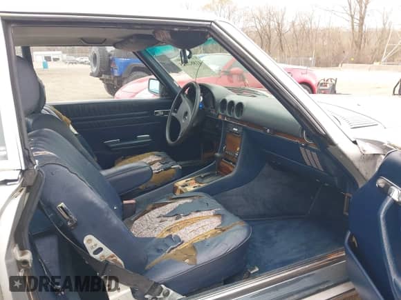 1983 Mercedes-Benz 380 SL with VIN WDBBA45A0DB024774, listed as a IAAI auction lot 41882815 with 138,386 mi miles and . Bid and sale history available at DreamBid. Image 5.