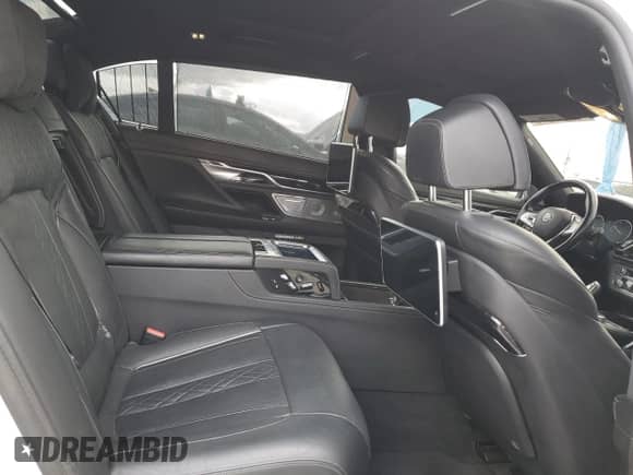 2016 BMW 7 Series 750i with VIN WBA7F0C57GGL99833, listed as a Copart auction lot 53255205 with Not provided miles and Salvage title. Bid and sale history available at DreamBid. Image 10.