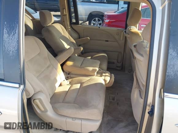 2005 Honda Odyssey EX z VIN 5FNRL38465B044990, wystawiony jako IAAI lot #43334598 z przebiegiem 177 732 mil mil oraz . Historia ofert i sprzedaży dostępna na DreamBid. Obrazek 8.