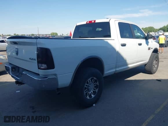 2010 Dodge 2500 ST with VIN 3D7TT2CT1AG159988, listed as a IAAI auction lot 42551960 with 231,503 mi miles and . Bid and sale history available at DreamBid. Image 4.
