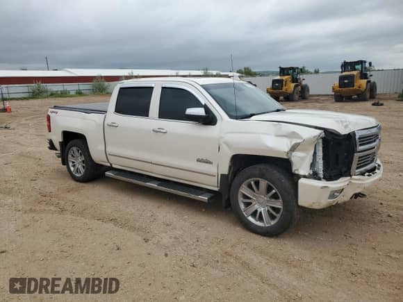 2015 Chevrolet Silverado 1500 High Country с VIN 3GCUKTEJ1FG191463, выставлен на аукционе Copart как лот 57151865 с пробегом 124 420 миль миль и Списание • Salvage title. История ставок и продаж доступна на DreamBid. Изображение 4.