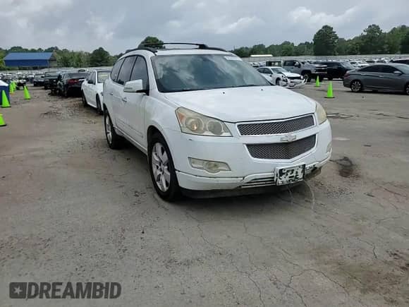 2009 Chevrolet Traverse LTZ z VIN 1GNER33D39S155758, wystawiony jako Copart lot #62319575 z przebiegiem 144 405 mil mil oraz Szkoda całkowita • Salvage title. Historia ofert i sprzedaży dostępna na DreamBid. Obrazek 14.