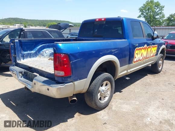 2010 Dodge 2500 Laramie with VIN 3D7UT2CL5AG167290, listed as a IAAI auction lot 42849284 with 305,019 mi miles and . Bid and sale history available at DreamBid. Image 4.