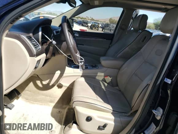 2017 Jeep Grand Cherokee Overland with VIN 1C4RJFCT9HC697479, listed as a Copart auction lot 80870705 with 86,058 mi miles and Salvage title. Bid and sale history available at DreamBid. Image 7.
