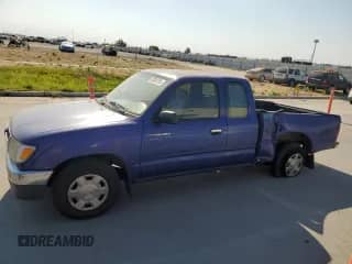 1997 Toyota Tacoma with VIN 4TAVL52NXVZ238083, listed as a Copart auction lot 67034755 with 214,920 mi miles and Salvage title. Bid and sale history available at DreamBid. Image 1.