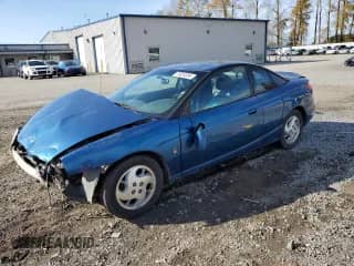 2002 Saturn SC with VIN 1G8ZY14762Z129155, listed as a Copart auction lot 75820394 with 199,847 mi miles and Salvage title. Bid and sale history available at DreamBid. Image 1.