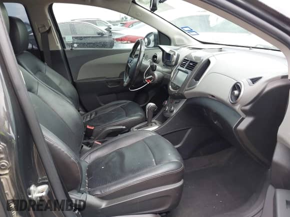 2015 Chevrolet Sonic LTZ with VIN 1G1JE5SB3F4101447, listed as a IAAI auction lot 42964440 with 148,815 mi miles and . Bid and sale history available at DreamBid. Image 5.