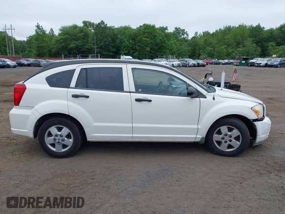 2008 Dodge Caliber SE with VIN 1B3HB28B28D625598, listed as a IAAI auction lot 42449035 with 125,987 mi miles and . Bid and sale history available at DreamBid. Image 13.
