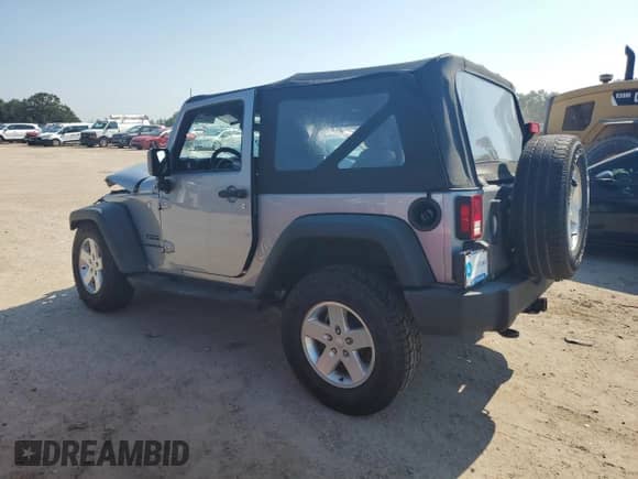 2015 Jeep Wrangler Sport with VIN 1C4AJWAGXFL549342, listed as a Copart auction lot 68863065 with 59,818 mi miles and Salvage title. Bid and sale history available at DreamBid. Image 2.