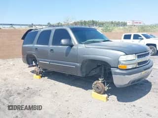 2001 Chevrolet Tahoe LS z VIN 1GNEC13T51J153677, wystawiony jako IAAI lot #42459552 z przebiegiem 201 209 mil mil oraz . Historia ofert i sprzedaży dostępna na DreamBid. Obrazek 1.