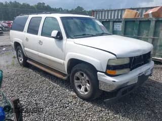 2002 Chevrolet Suburban Z71 z VIN 3GNFK16ZX2G301459, wystawiony jako IAAI lot #42793092 z przebiegiem 376 025 mil mil oraz . Historia ofert i sprzedaży dostępna na DreamBid. Obrazek 1.