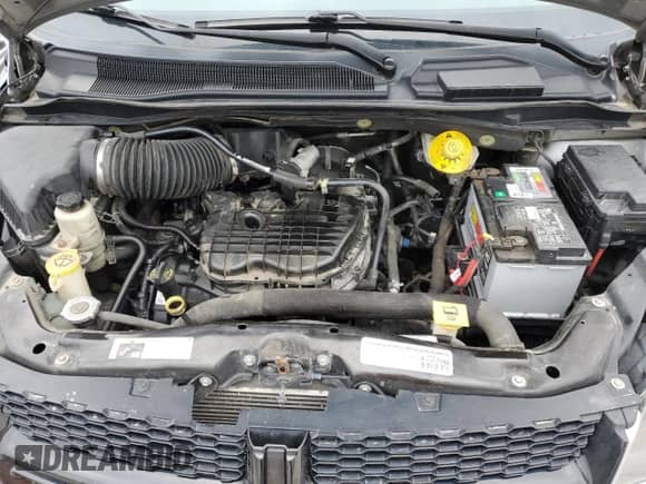 2015 Dodge Grand Caravan SXT with VIN 2C4RDGCG4FR605473, listed as a Copart auction lot 52689925 with 179,966 mi miles and Salvage title. Bid and sale history available at DreamBid. Image 12.