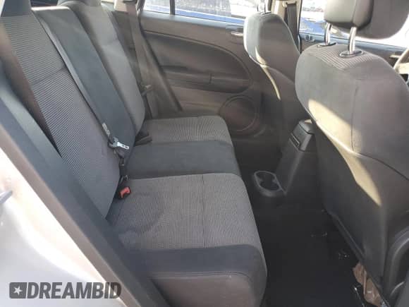 2011 Dodge Caliber Mainstreet with VIN 1B3CB3HA6BD225509, listed as a Copart auction lot 81013405 with 131,269 mi miles and Salvage title. Bid and sale history available at DreamBid. Image 11.
