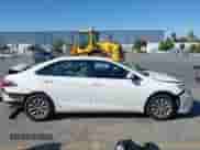 2015 Toyota Camry SE z VIN 4T1BF1FK8FU068002, wystawiony jako IAAI lot #43106714 z przebiegiem 102 717 mil mil oraz . Historia ofert i sprzedaży dostępna na DreamBid. Obrazek 14.