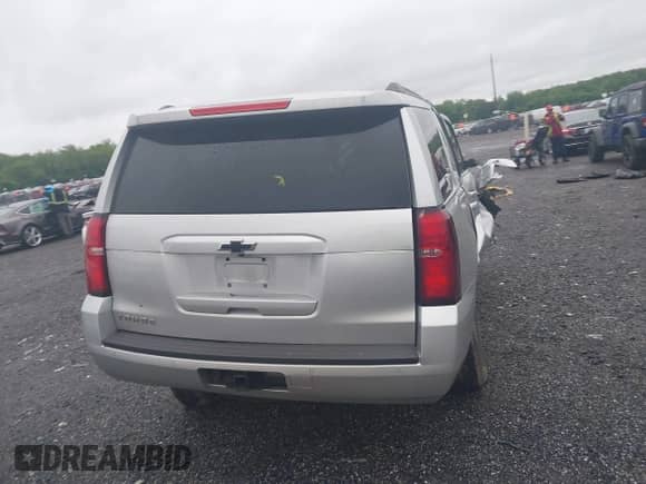 2019 Chevrolet Tahoe LS with VIN 1GNSKAKC2KR185738, listed as a IAAI auction lot 42325196 with Not provided miles and . Bid and sale history available at DreamBid. Image 16.