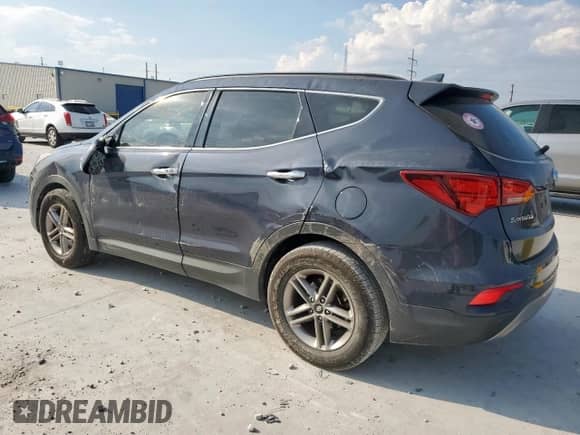 2018 Hyundai Santa Fe 2.4L z VIN 5NMZU3LB3JH072578, wystawiony jako Copart lot #80745675 z przebiegiem 84 682 mil mil oraz Szkoda całkowita • Salvage title. Historia ofert i sprzedaży dostępna na DreamBid. Obrazek 2.
