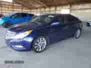 2013 Hyundai Sonata SE with VIN 5NPEC4AC0DH734210, listed as a Copart auction lot 86682685 with 128,143 mi miles and Salvage title. Bid and sale history available at DreamBid. Image 1.