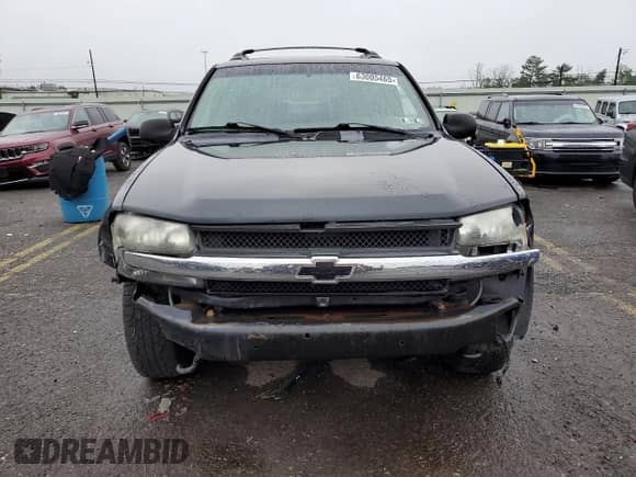 2003 Chevrolet TrailBlazer EXT LT z VIN 1GNET16S736180632, wystawiony jako Copart lot #63005465 z przebiegiem 155 862 mil mil oraz Szkoda całkowita • Salvage title. Historia ofert i sprzedaży dostępna na DreamBid. Obrazek 5.
