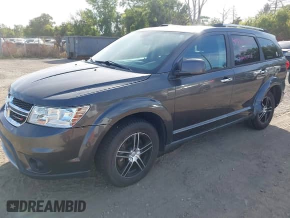2014 Dodge Journey Limited with VIN 3C4PDDDG6ET152232, listed as a IAAI auction lot 43360738 with 164,179 mi miles and . Bid and sale history available at DreamBid. Image 2.