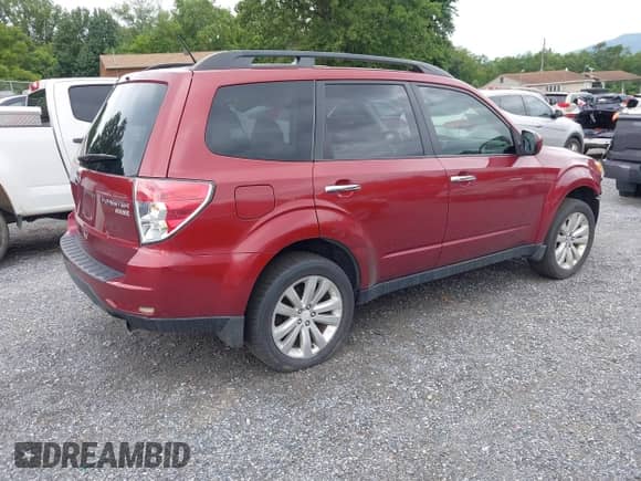 2011 Subaru Forester X Premium z VIN JF2SHADC9BG742436, wystawiony jako IAAI lot #42774895 z przebiegiem 218 696 mil mil oraz . Historia ofert i sprzedaży dostępna na DreamBid. Obrazek 4.