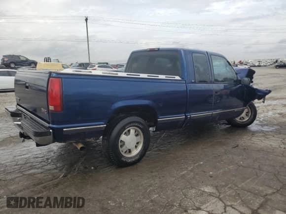 1998 GMC Sierra 1500 z VIN 2GTEC19M7W1508312, wystawiony jako Copart lot #79460454 z przebiegiem 303 454 mil mil oraz Szkoda całkowita • Salvage title. Historia ofert i sprzedaży dostępna na DreamBid. Obrazek 3.