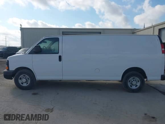 2015 Chevrolet Express Cargo with VIN 1GCWGGCF0F1184129, listed as a IAAI auction lot 42705530 with 185,687 mi miles and . Bid and sale history available at DreamBid. Image 14.