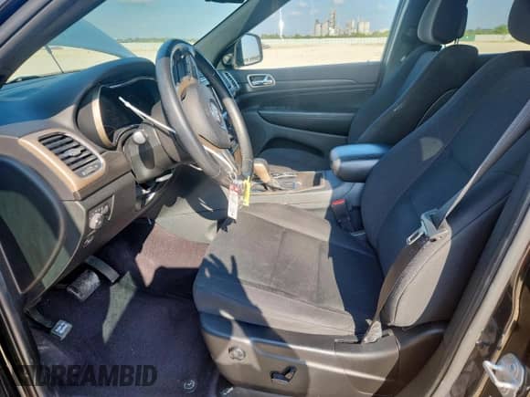 2016 Jeep Grand Cherokee Laredo with VIN 1C4RJEAG9GC339636, listed as a Copart auction lot 80900365 with 74,310 mi miles and Salvage title. Bid and sale history available at DreamBid. Image 7.