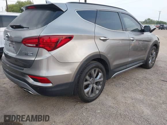 2018 Hyundai Santa Fe Ultimate с VIN 5NMZWDLAXJH100108, выставлен на аукционе IAAI как лот 42126768 с пробегом 68 325 миль миль и . История ставок и продаж доступна на DreamBid. Изображение 4.