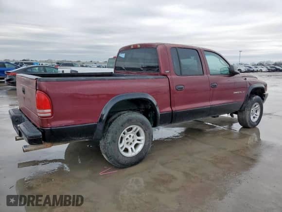 2002 Dodge Dakota SLT с VIN 1B7HG48N32S615218, выставлен на аукционе Copart как лот 58251685 с пробегом Не указан миль и Списание • Salvage title. История ставок и продаж доступна на DreamBid. Изображение 3.