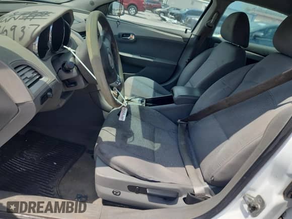 2010 Chevrolet Malibu 1FL with VIN 1G1ZA5E03AF253749, listed as a Copart auction lot 70869375 with 214,800 mi miles and Salvage title. Bid and sale history available at DreamBid. Image 7.
