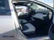 2025 Toyota Corolla XSE with VIN JTNC4MBEXS3242177, listed as a IAAI auction lot 41820383 with 7,897 mi miles and . Bid and sale history available at DreamBid. Image 5.