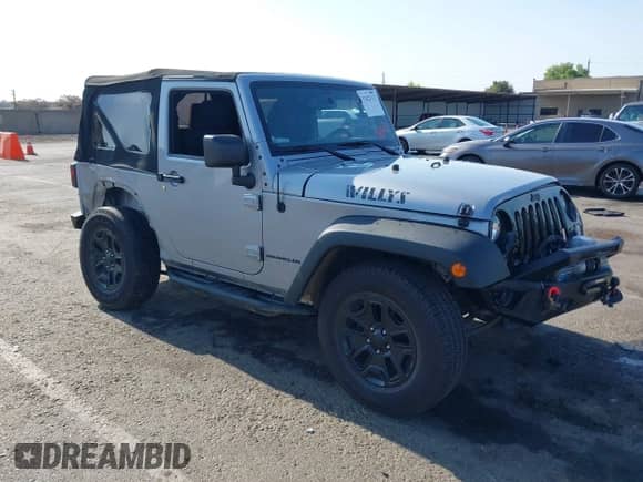 2015 Jeep Wrangler Sport with VIN 1C4AJWAG0FL773008, listed as a IAAI auction lot 42422112 with 88,370 mi miles and . Bid and sale history available at DreamBid. Image 1.