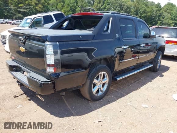 2013 Chevrolet Avalanche LTZ with VIN 3GNTKGE72DG214115, listed as a IAAI auction lot 43064126 with 194,373 mi miles and . Bid and sale history available at DreamBid. Image 4.
