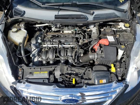 2012 Ford Fiesta SE with VIN 3FADP4BJ4CM114102, listed as a Copart auction lot 81820825 with 104,879 mi miles and Salvage title. Bid and sale history available at DreamBid. Image 11.