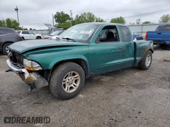 2004 Dodge Dakota SLT with VIN 1D7GL42K04S612274, listed as a Copart auction lot 57443075 with 258,513 mi miles and Salvage title. Bid and sale history available at DreamBid. Image 1.