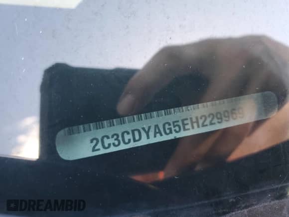 2014 Dodge Challenger SXT z VIN 2C3CDYAG5EH229969, wystawiony jako Copart lot #85288785 z przebiegiem 194 859 mil mil oraz Szkoda całkowita • Salvage title. Historia ofert i sprzedaży dostępna na DreamBid. Obrazek 12.