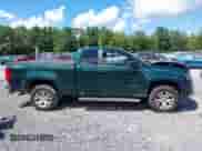 2016 Chevrolet Colorado 4WD LT z VIN 1GCHTCE37G1216883, wystawiony jako IAAI lot #43071845 z przebiegiem 117 016 mil mil oraz . Historia ofert i sprzedaży dostępna na DreamBid. Obrazek 13.