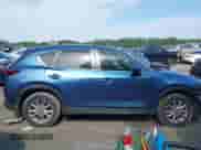 2023 Mazda CX-5 S Preferred z VIN JM3KFBCM3P0255230, wystawiony jako IAAI lot #42420823 z przebiegiem 69 331 mil mil oraz . Historia ofert i sprzedaży dostępna na DreamBid. Obrazek 13.