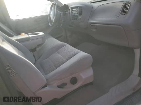 2002 Ford F-150 XL с VIN 2FTRF18W32CA50195, выставлен на аукционе Copart как лот 88857825 с пробегом 113 529 миль миль и Чистый • Clean title. История ставок и продаж доступна на DreamBid. Изображение 8.