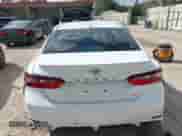 2023 Toyota Camry SE with VIN 4T1G11AKXPU755740, listed as a IAAI auction lot 43464689 with 35,445 mi miles and . Bid and sale history available at DreamBid. Image 16.