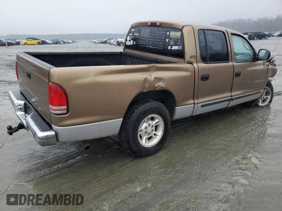 2000 Dodge Dakota Sport with VIN 1B7GL2AN9YS640235, listed as a Copart auction lot 83974074 with 161,896 mi miles and Salvage title. Bid and sale history available at DreamBid. Image 3.