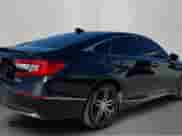 2022 Honda Accord Touring с VIN 1HGCV3F93NA031042, выставлен на аукционе Copart как лот 84067355 с пробегом 241 825 миль миль и Чистый • Clean title. История ставок и продаж доступна на DreamBid. Изображение 4.