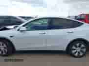2021 Tesla Model Y Long Range with VIN 5YJYGDEE0MF095080, listed as a IAAI auction lot 42931169 with Not provided miles and . Bid and sale history available at DreamBid. Image 13.