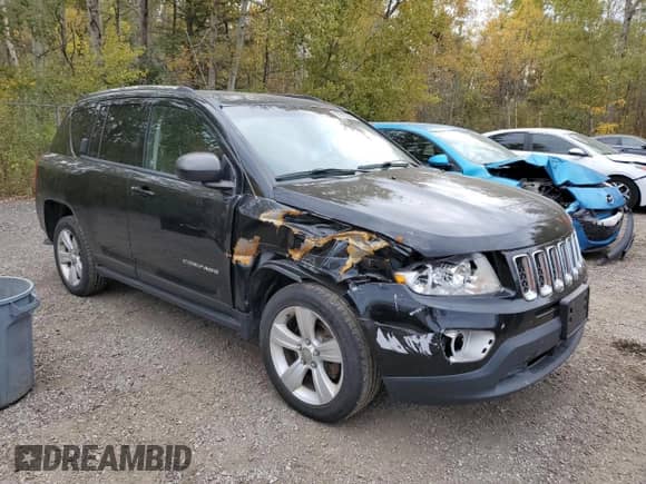 2012 Jeep Compass Sport z VIN 1C4NJCAB2CD615344, wystawiony jako Copart lot #86085345 z przebiegiem 223 341 mil mil oraz Szkoda całkowita • Salvage title. Historia ofert i sprzedaży dostępna na DreamBid. Obrazek 4.
