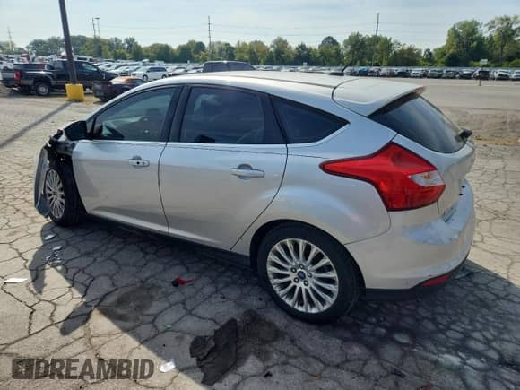 2012 Ford Focus Titanium с VIN 1FAHP3N21CL145339, выставлен на аукционе Copart как лот 80813695 с пробегом 112 145 миль миль и Списание • Salvage title. История ставок и продаж доступна на DreamBid. Изображение 2.
