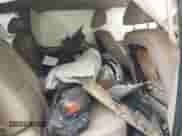 2009 Chevrolet Suburban 1LT z VIN 1GNFC260X9J108211, wystawiony jako IAAI lot #42237663 z przebiegiem Nie podano mil oraz . Historia ofert i sprzedaży dostępna na DreamBid. Obrazek 8.