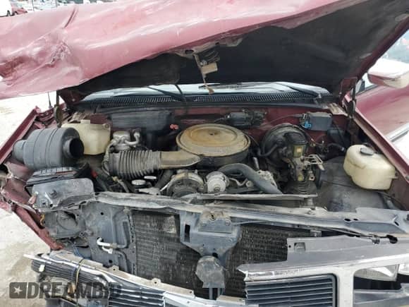 1989 GMC Sierra 1500 z VIN 1GTDC14K6KZ538579, wystawiony jako Copart lot #85916624 z przebiegiem 172 202 mil mil oraz Szkoda całkowita • Salvage title. Historia ofert i sprzedaży dostępna na DreamBid. Obrazek 11.