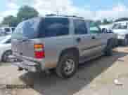 2003 Chevrolet Tahoe LT z VIN 1GNEC13Z13R264753, wystawiony jako IAAI lot #42625437 z przebiegiem Nie podano mil oraz . Historia ofert i sprzedaży dostępna na DreamBid. Obrazek 4.