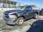 2014 Ram 1500 Tradesman with VIN 3C6JR6ATXEG143845, listed as a Copart auction lot 76970934 with 141,762 mi miles and Non repairable. Bid and sale history available at DreamBid. Image 1.